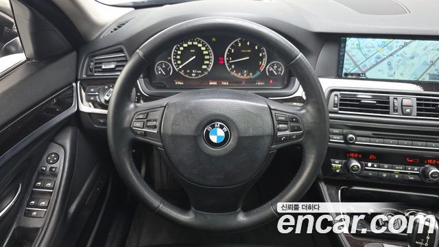 BMW 5-Series 2011 — photo 14