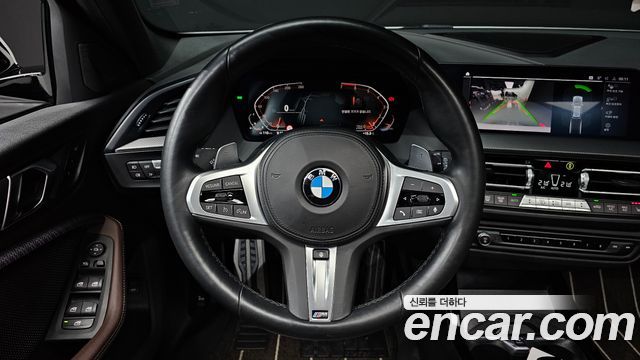 BMW 1-Series 2023 — photo 13