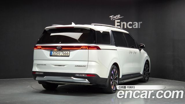 Kia Canival 2021 — photo 2