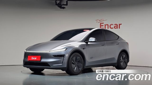 Tesla Model Y 2025 — photo 38