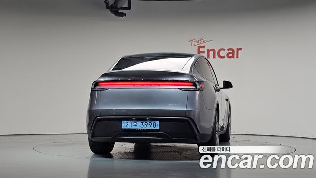 Tesla Model Y 2025 — photo 4
