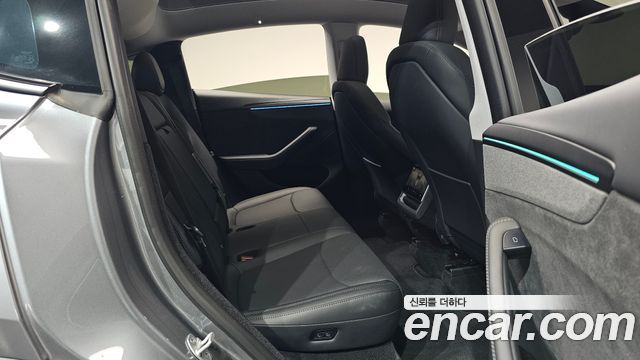 Tesla Model Y 2025 — photo 17