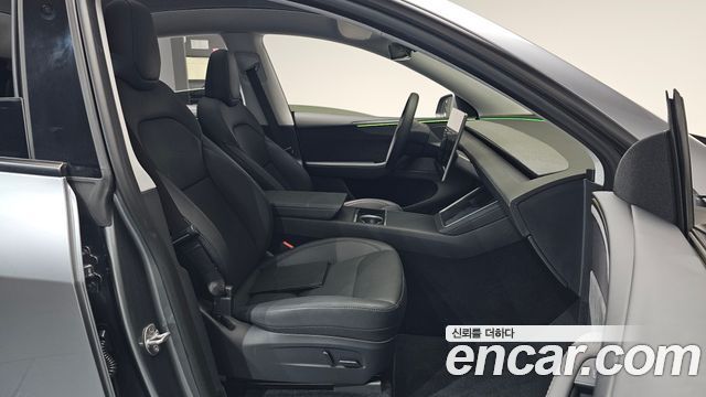 Tesla Model Y 2025 — photo 16
