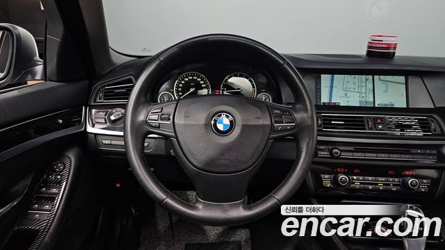 BMW 5-Series 2012 — photo 18