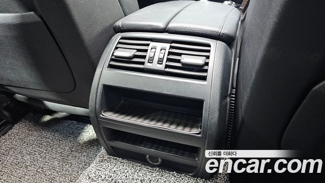 BMW 5-Series 2012 — photo 27