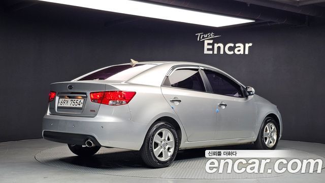 Kia Porte 2012 — photo 2