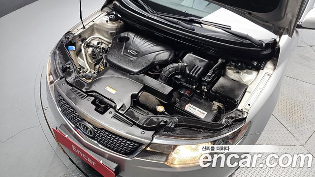 Kia Porte 2012 — photo 6