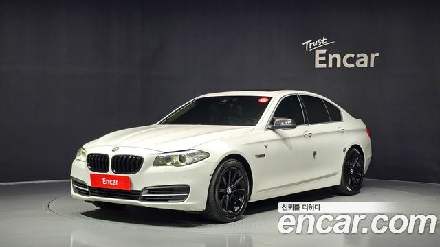 BMW 5-Series 2014 — photo 1