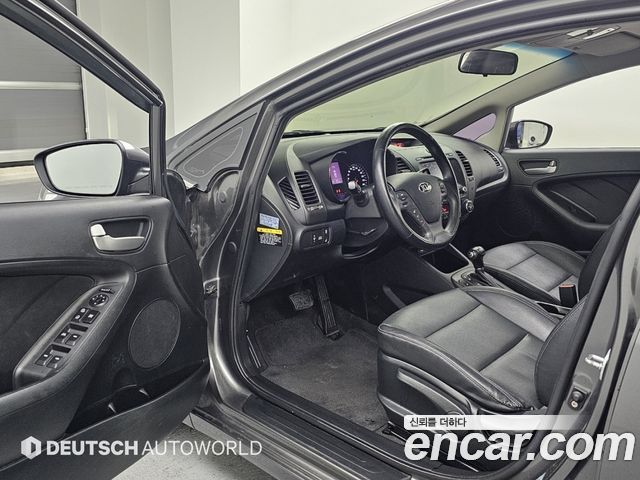 Kia K3 2013 — photo 11