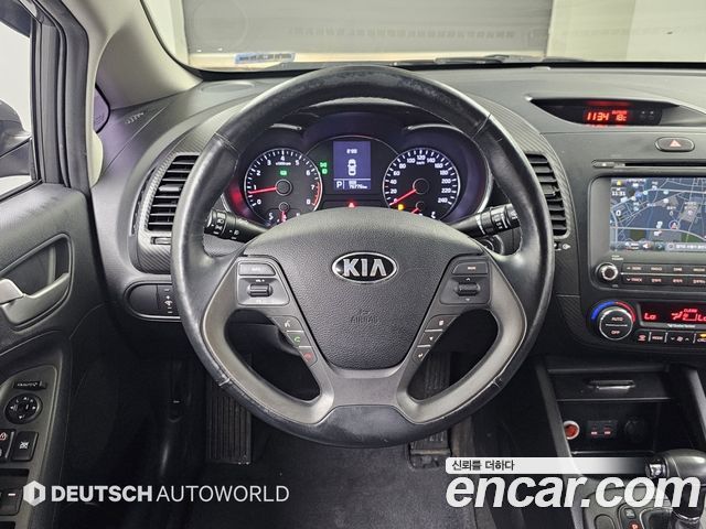 Kia K3 2013 — photo 13