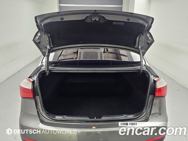 Kia K3 2013 — photo 19