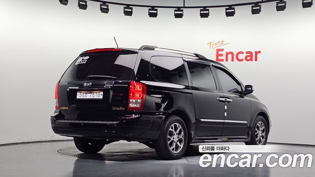 Kia Canival 2014 — photo 2