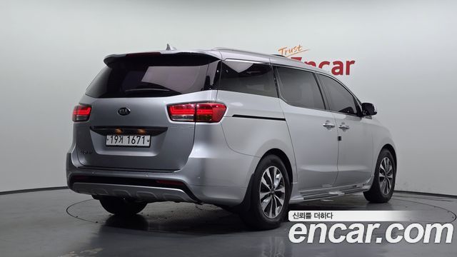 Kia Canival 2015 — photo 2