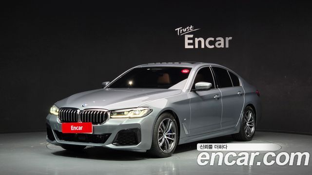 BMW 5-Series 2023 — photo 1