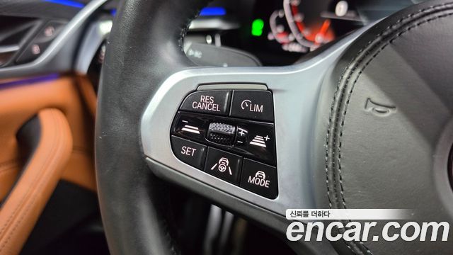 BMW 5-Series 2023 — photo 22