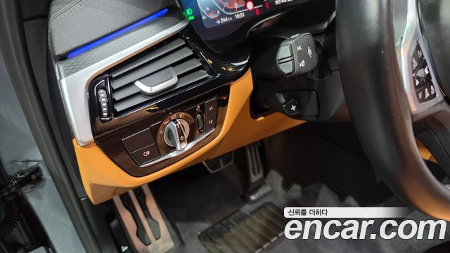 BMW 5-Series 2023 — photo 24