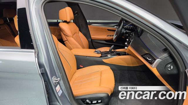 BMW 5-Series 2023 — photo 16