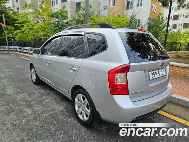 Kia Carens 2009 — photo 2