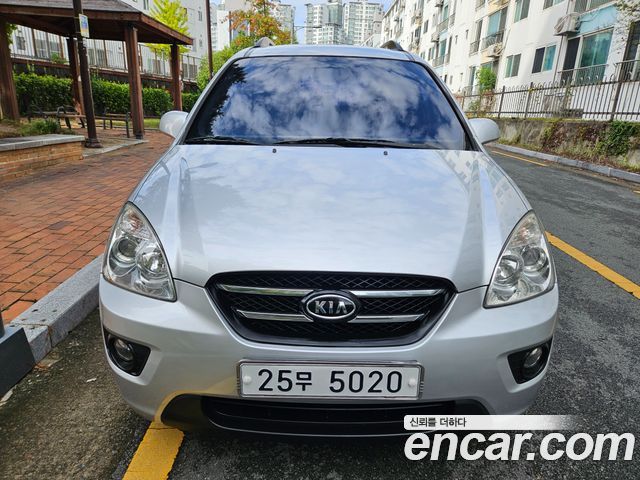 Kia Carens 2009 — photo 3