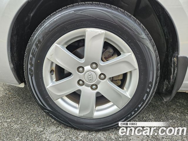 Kia Carens 2009 — photo 5