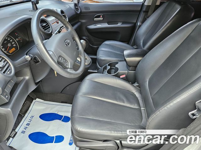 Kia Carens 2009 — photo 10