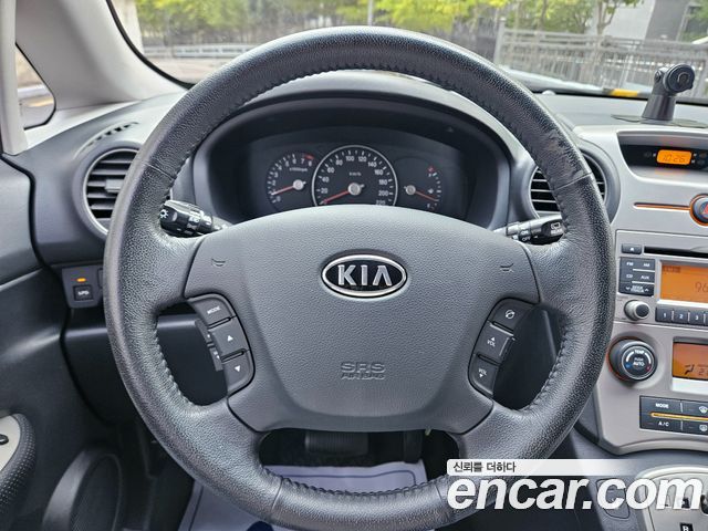 Kia Carens 2009 — photo 12