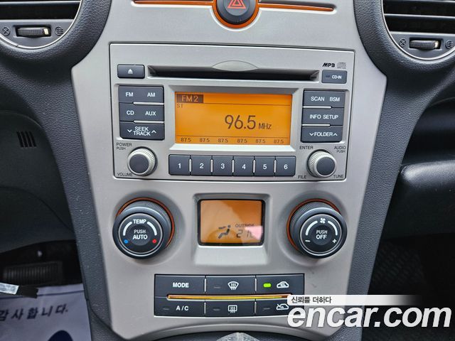 Kia Carens 2009 — photo 13