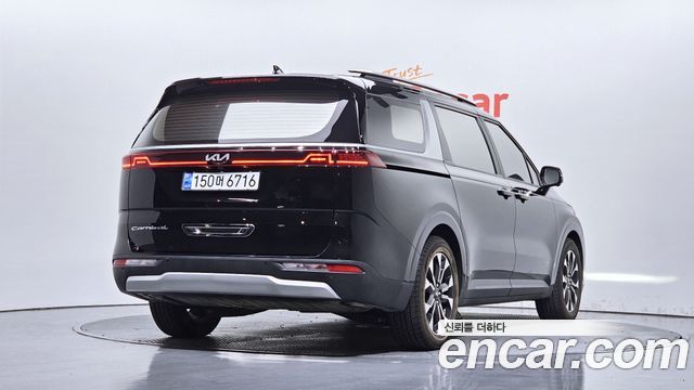 Kia Canival 2021 — photo 2