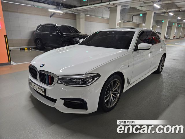 BMW 5-Series 2018 — photo 1