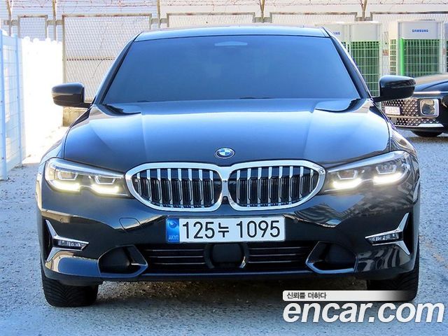 BMW 3-Series 2021 — photo 1
