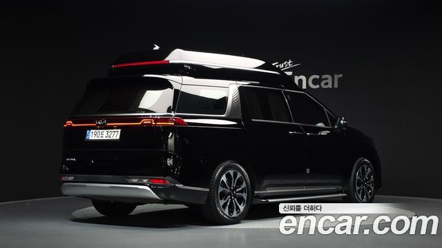 Kia Canival 2022 — photo 2