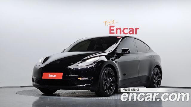 Tesla Model Y 2023 — photo 1