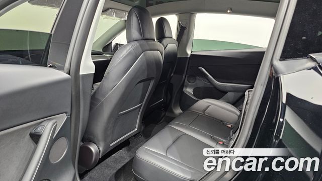 Tesla Model Y 2023 — photo 18