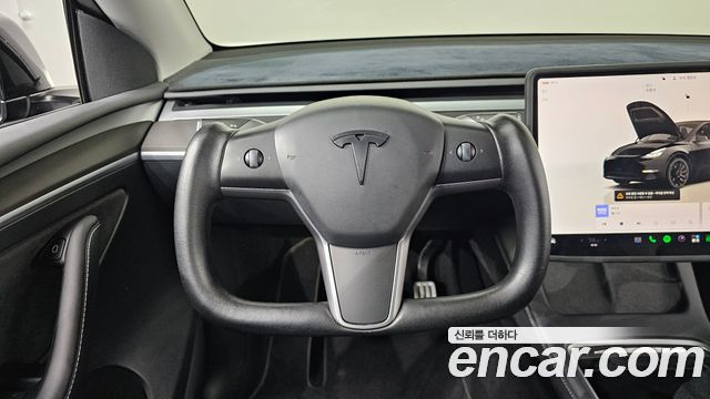 Tesla Model Y 2023 — photo 19