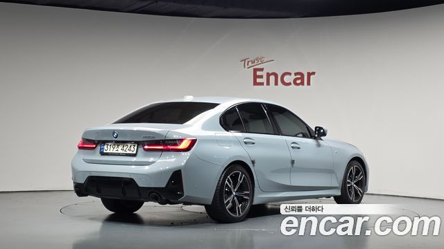 BMW 3-Series 2023 — photo 2