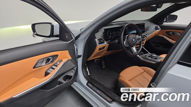 BMW 3-Series 2023 — photo 13