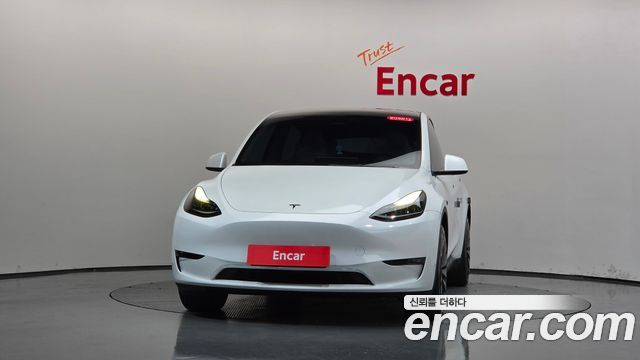 Tesla Model Y 2024 — photo 3
