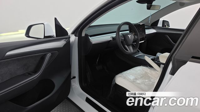 Tesla Model Y 2024 — photo 13