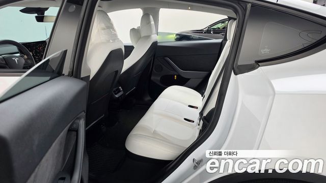Tesla Model Y 2024 — photo 17
