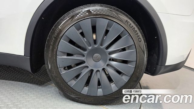 Tesla Model Y 2024 — photo 7
