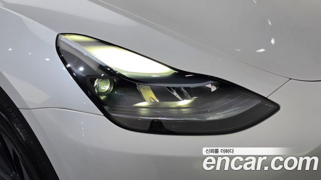 Tesla Model Y 2024 — photo 8
