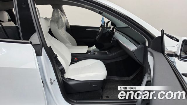 Tesla Model Y 2024 — photo 16