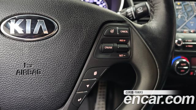 Kia K3 2015 — photo 22