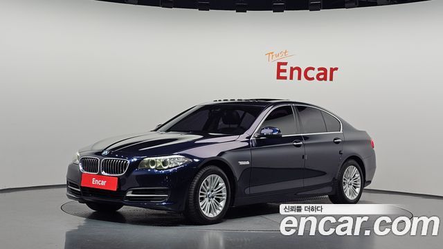 BMW 5-Series 2015 — photo 1