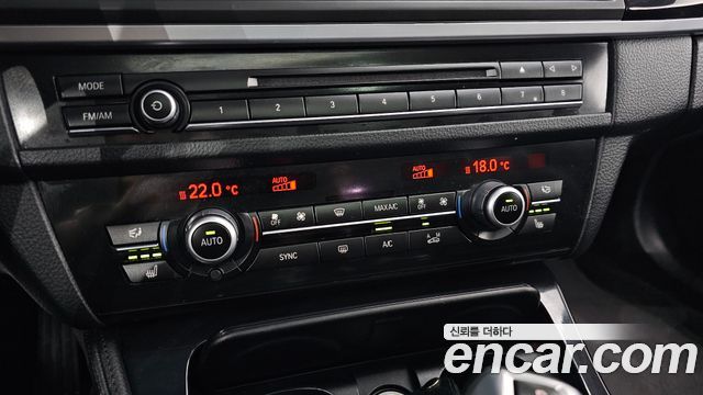 BMW 5-Series 2015 — photo 34