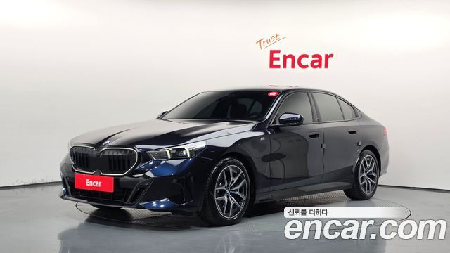BMW 5-Series 2024 — photo 1