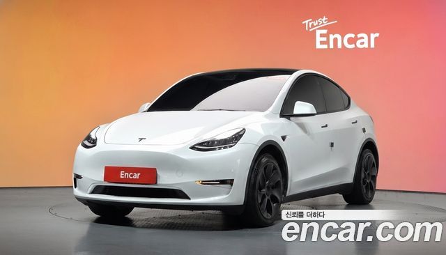 Tesla Model Y 2022 — photo 1