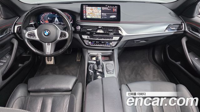 BMW 5-Series 2023 — photo 10