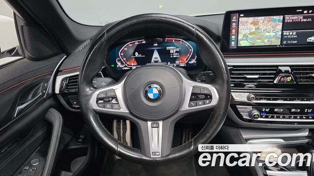 BMW 5-Series 2023 — photo 20