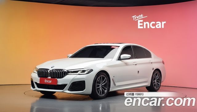 BMW 5-Series 2023 — photo 1